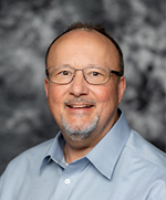 Manager - Christopher Hinrichs